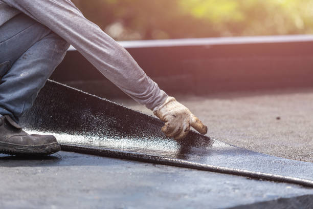 Professional Waterproofing technician working in Bedminster, NJ